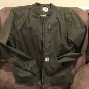 Army green color size 8/10 medium Carhartt jacket for women.